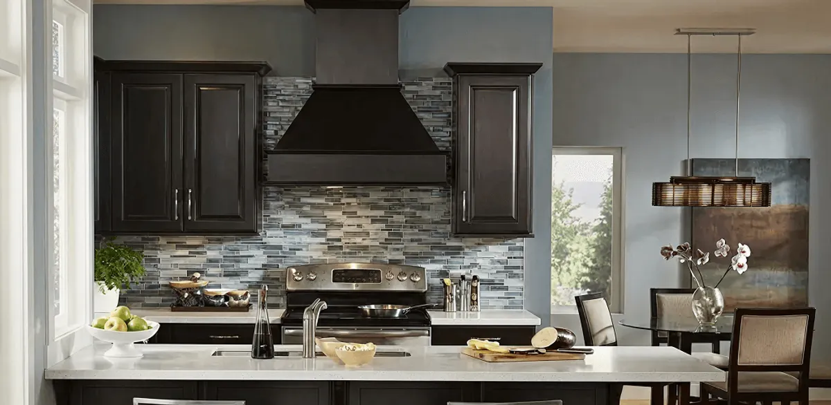 Kitchen cabinet painting and refinishing in a modern kitchen in Manchester, NH