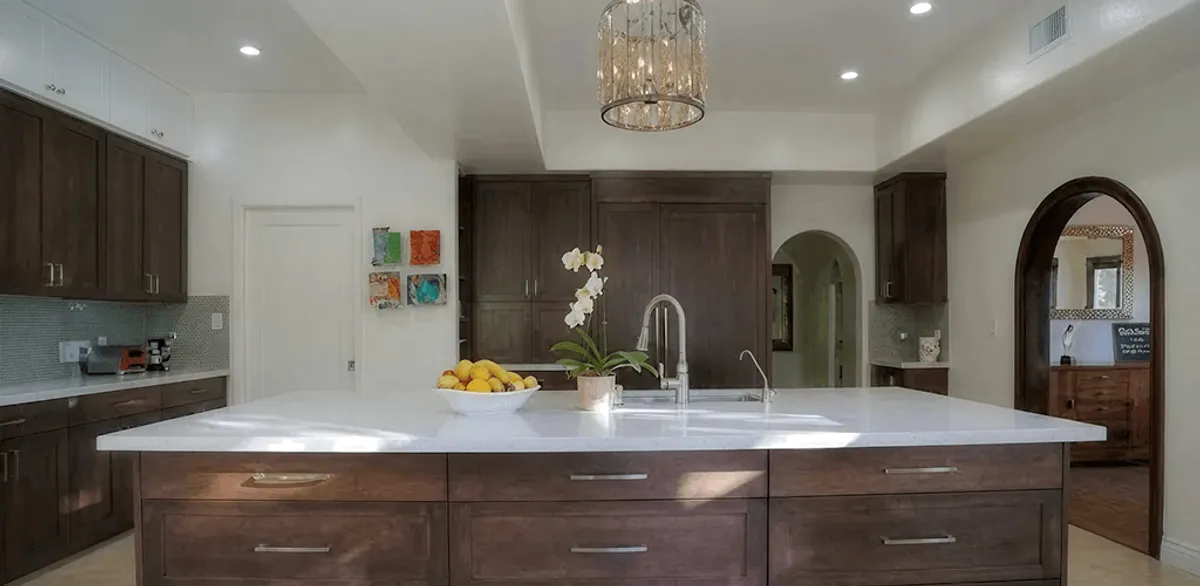 Cabinet refacing project with updated kitchen cabinets and island in Manchester, NH